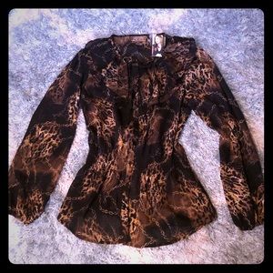 New ruffled button down animal print blouse